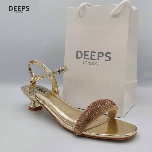 Side profile of women's Glimmer low flared heel sandals with diamante embellishments in gold, showcasing the low flared heel and sparkling straps for London fashion.