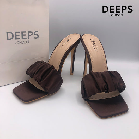Close-up detail of Lily satin ruched mule slip-on heel in brown, showcasing the luxurious satin and stylish ruched design, London style from DeepsLondon.