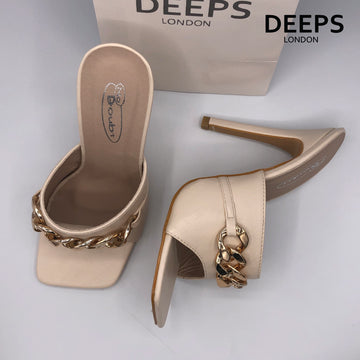 Front view of women's Zaki chain strap square toe stiletto heels in cream, edgy London style from DeepsLondon.