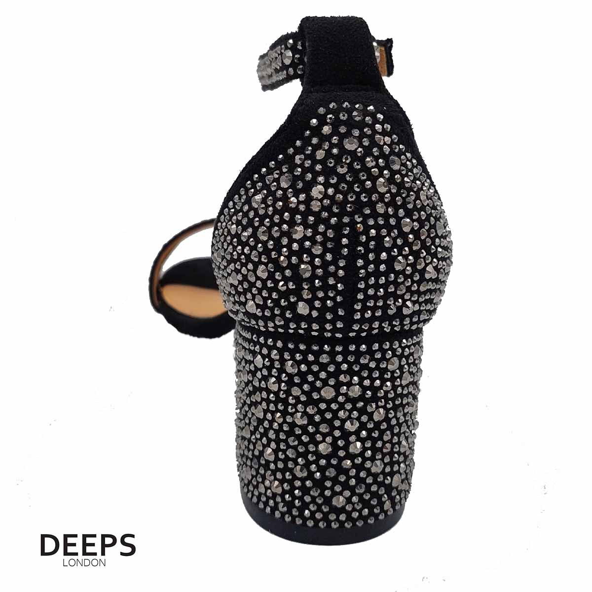 Woman's foot wearing stylish all-over diamante block heel sandals in Black, a comfortable and fashionable choice for London occasions from DeepsLondon.