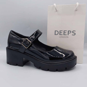 Front view of women's black chunky Mary Jane school uniform shoes, a classic and comfortable style in London.