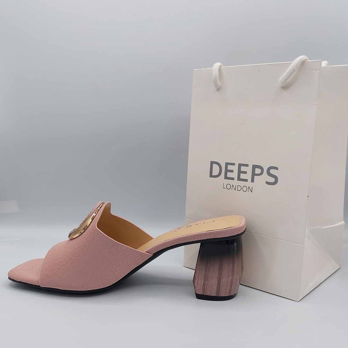 Side profile of women's breezy block heel open toe mules in pink, showcasing the block heel and easy slip-on design for London fashion.