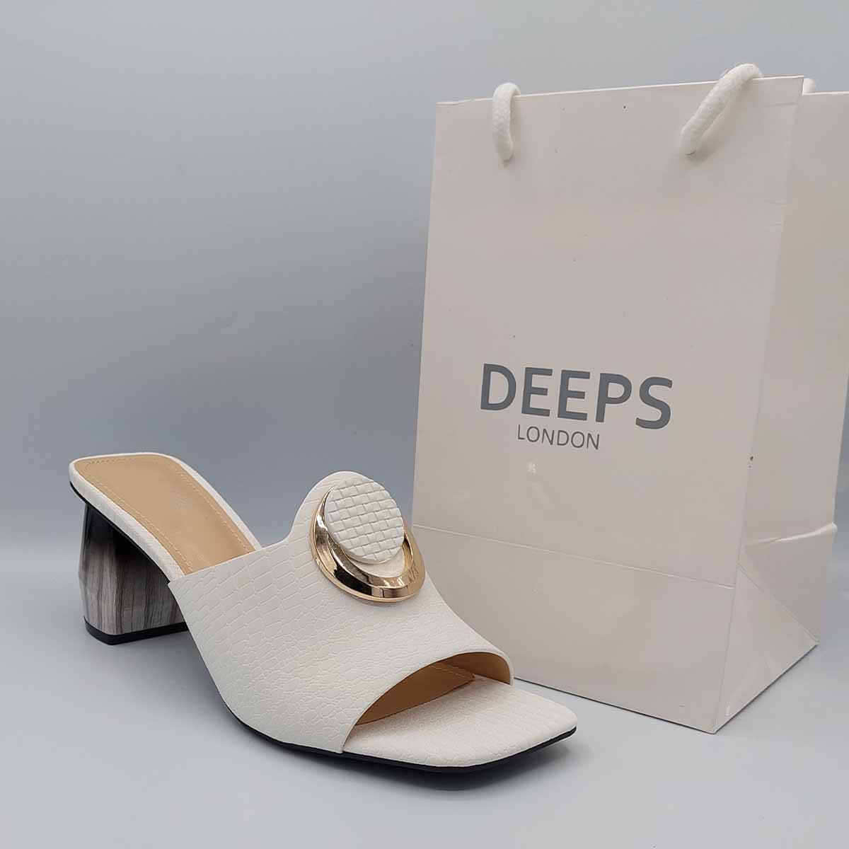 Side profile of women's breezy block heel open toe mules in white, showcasing the block heel and easy slip-on design for London fashion.
