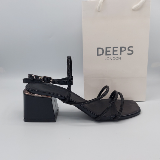 Front view of diamante embellished block heel sandals, a glamorous and stylish choice in London.