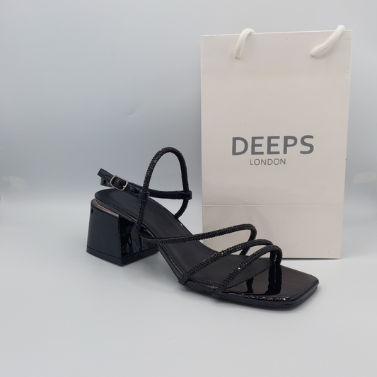 Side profile of diamante embellished block heel sandals, showcasing the block heel and strap detailing for London fashion.
