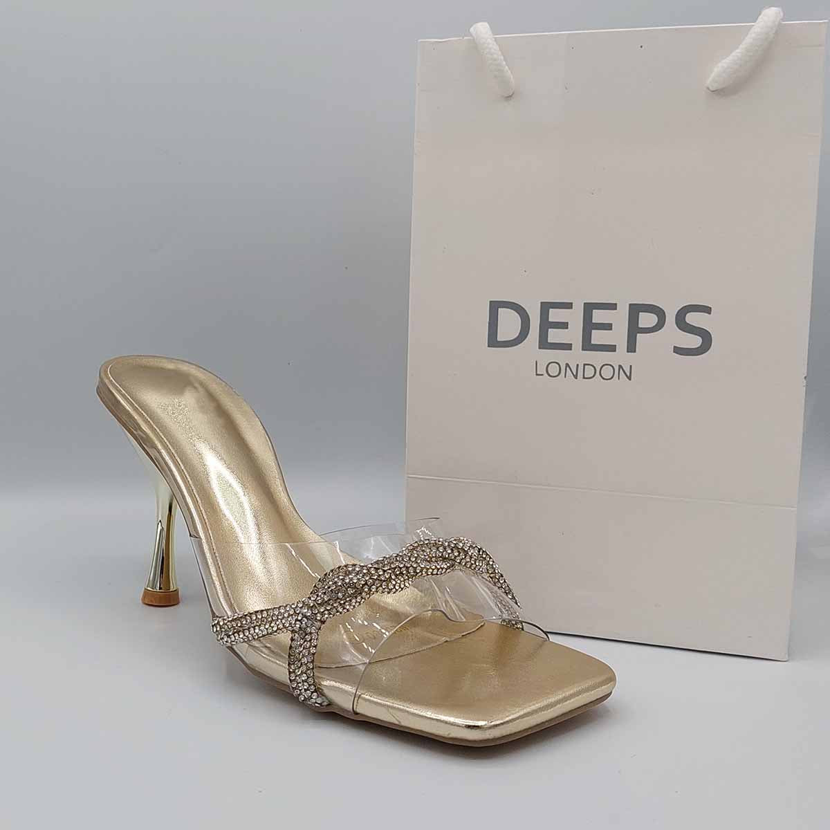 Side profile of women's diamante strappy mule sandals in gold, showcasing the elegant straps and sparkling diamante detailing for London fashion.
