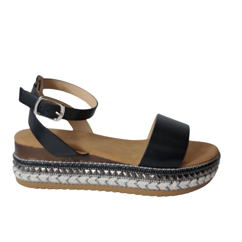 Side view of women's espadrille flatform sandals in black showcasing the wedge and strap details, stylish summer footwear from DeepsLondon in London.