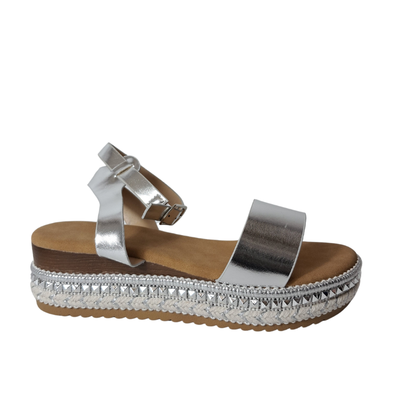 Other Side view of women's espadrille flatform sandals in silver showcasing the wedge and strap details, stylish summer footwear from DeepsLondon in London.