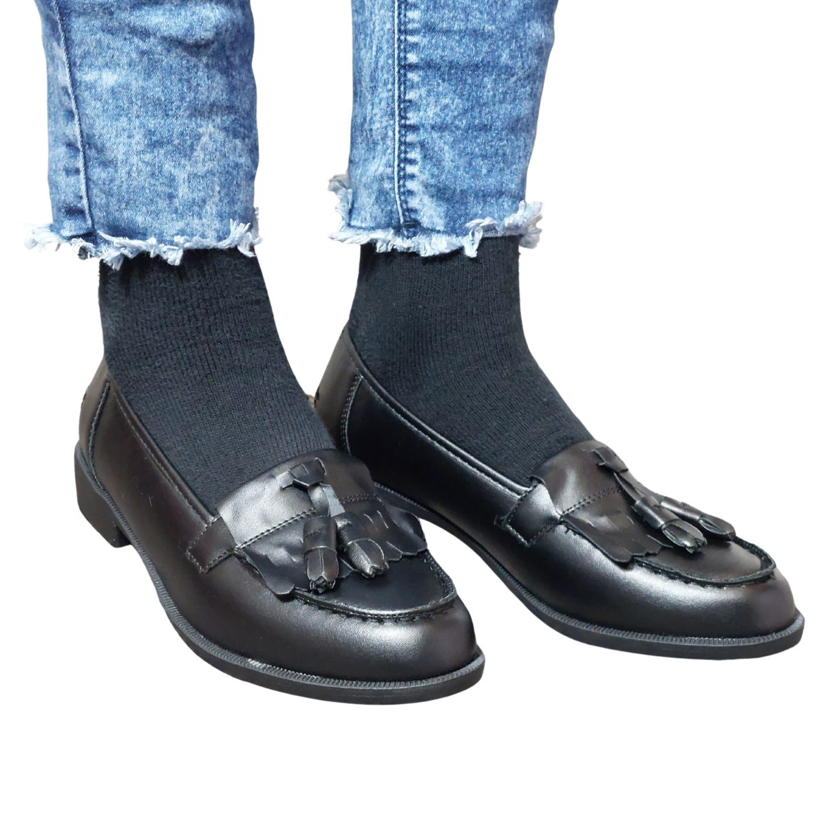 Front view of women's black pu fringe tassel loafers, a stylish footwear choice for London.