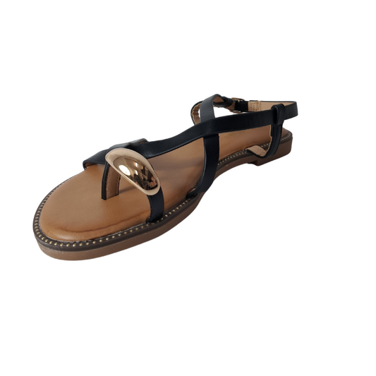 Front view of gold toe post flat sandals in black, showcasing the elegant gold toe post and comfortable flat sole, London style from DeepsLondon.