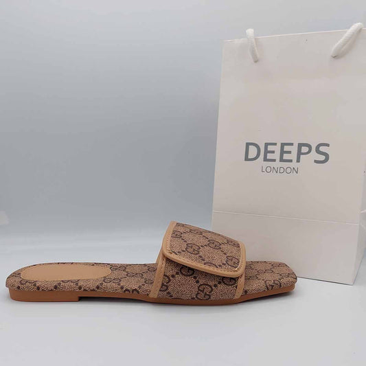 Front view of women's open toe flat slider sandals with a brown print, a casual and stylish option for London.