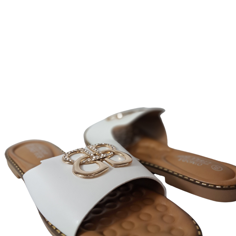 Close-up of the open toe and flat design on women's slip-on sandal in white, highlighting their comfortable and casual features from DeepsLondon.