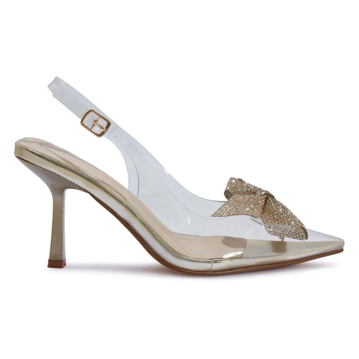 Side profile of women's perspex court shoe with diamante brooch detail in gold, showcasing the perspex material and brooch detailing.