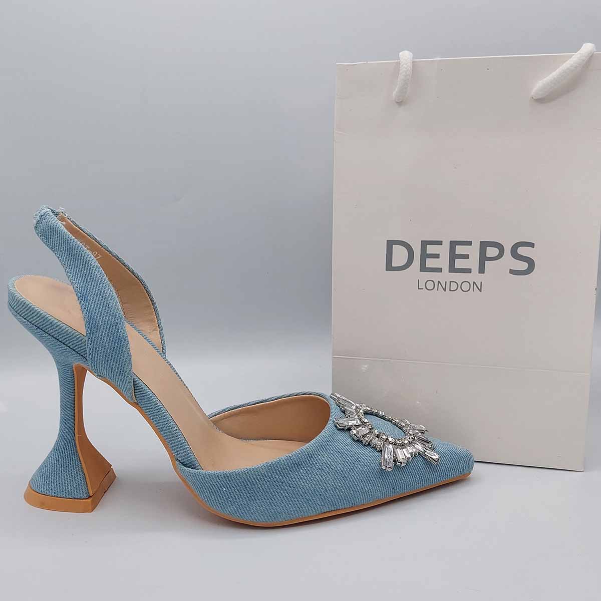 Side profile of women's satin court shoes with diamante detail in Light Blue, showcasing the heel and delicate embellishment for London fashion.