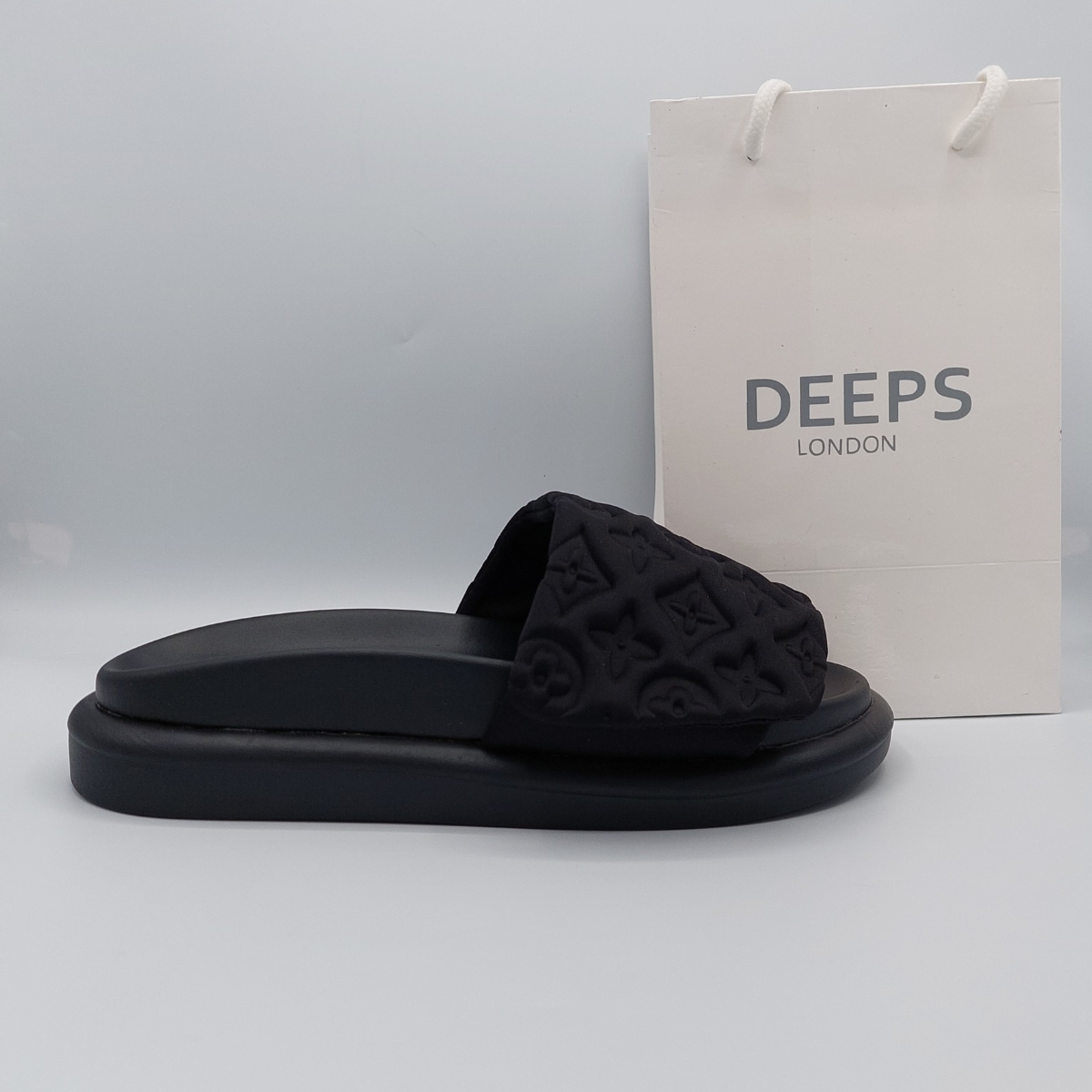 Front view of women's velcro strap flatform slider sandal in black, showcasing the adjustable straps and comfortable flatform sole.