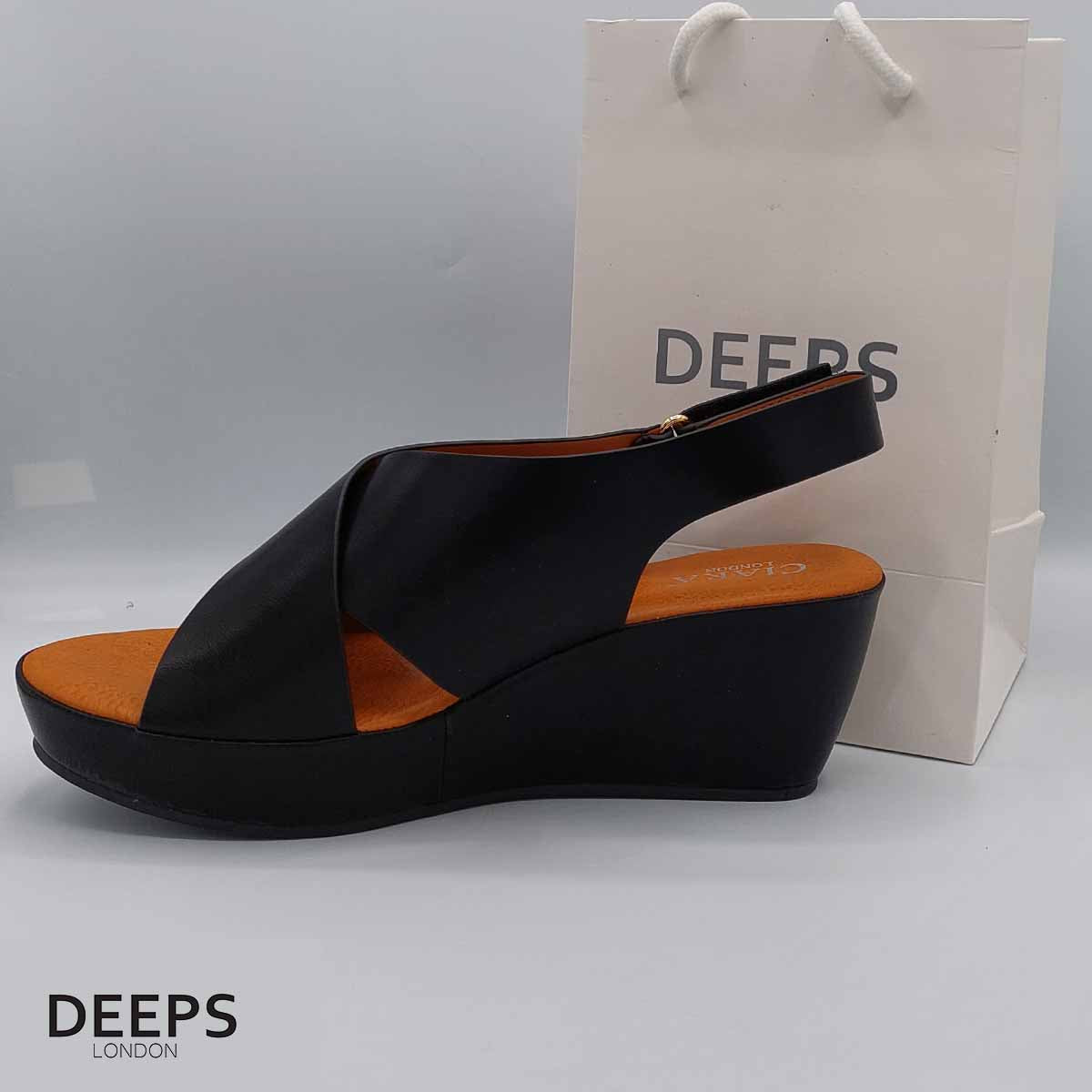 Close-up of the peep toe and wedge heel on women's sandal in Black, highlighting their comfortable and stylish features from DeepsLondon.