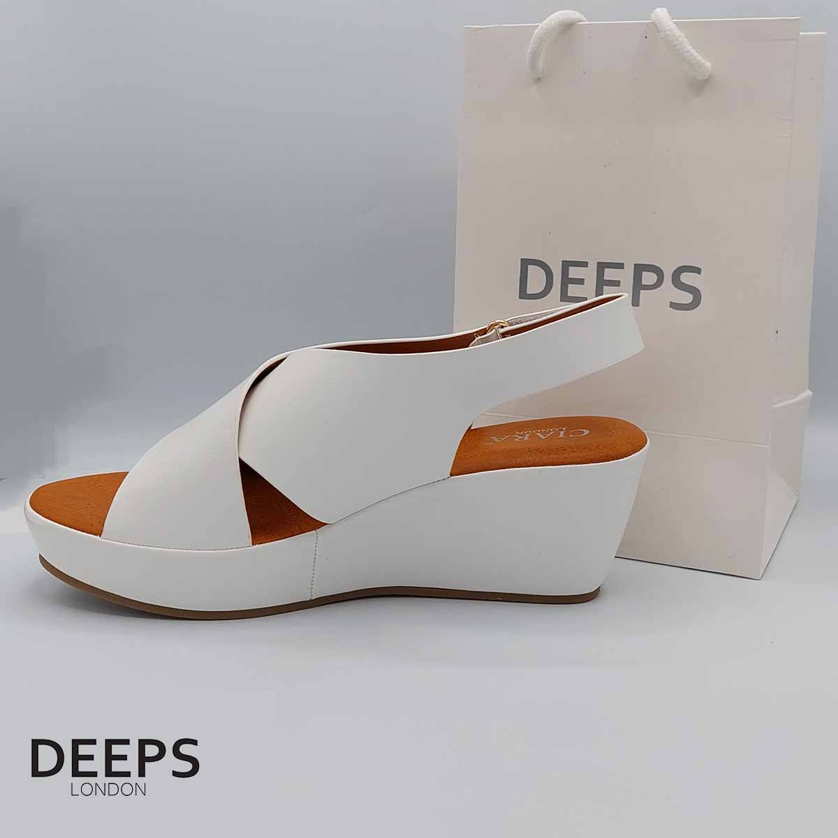 Close-up of the peep toe and wedge heel on women's sandal in White, highlighting their comfortable and stylish features from DeepsLondon.