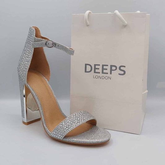 Front view of women's Lumina diamante embellished ankle strap block heel sandals in silver, sparkling occasion footwear for London from DeepsLondon.