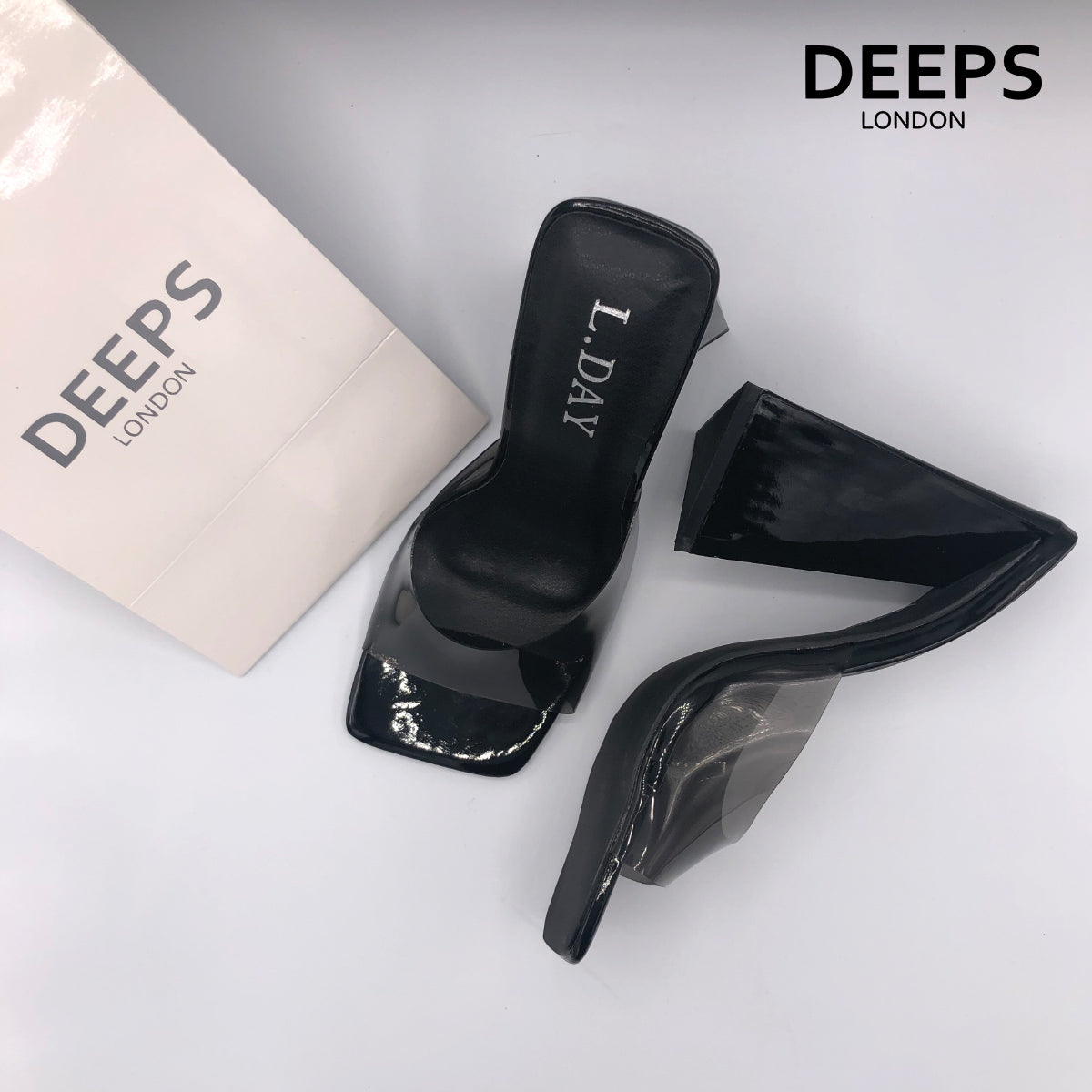 Close-up detail of Anastasia square toe high heel mule in classic black, showcasing the modern square toe and sleek design, London style from DeepsLondon.