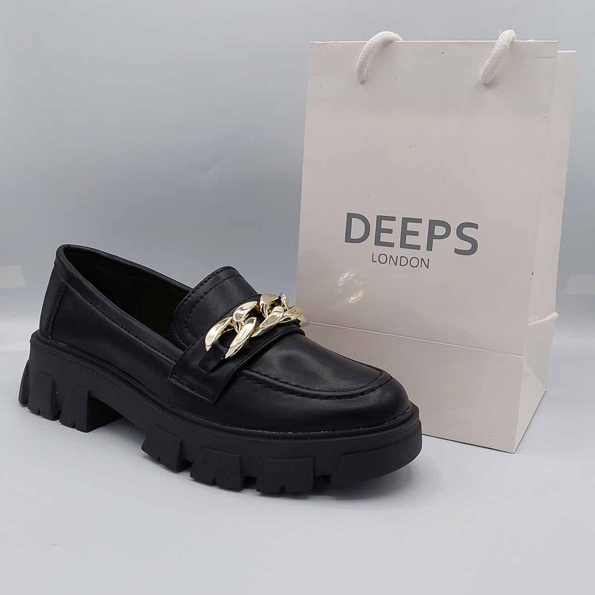 Front view of women's black PU flat loafer with a chunky platform and chain detail, a stylish and durable option for London.