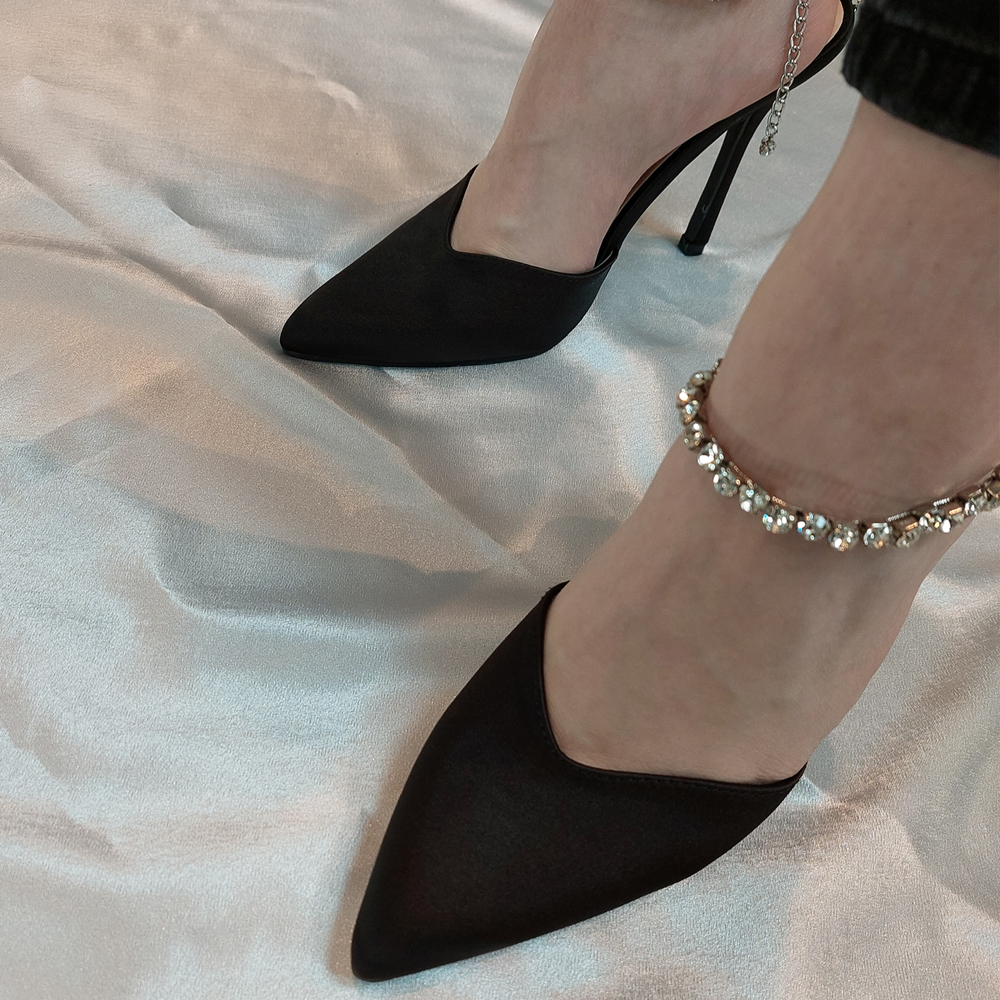 Front view of women's Celestial satin court shoes with diamante ankle chain in black, sparkling London style from DeepsLondon.