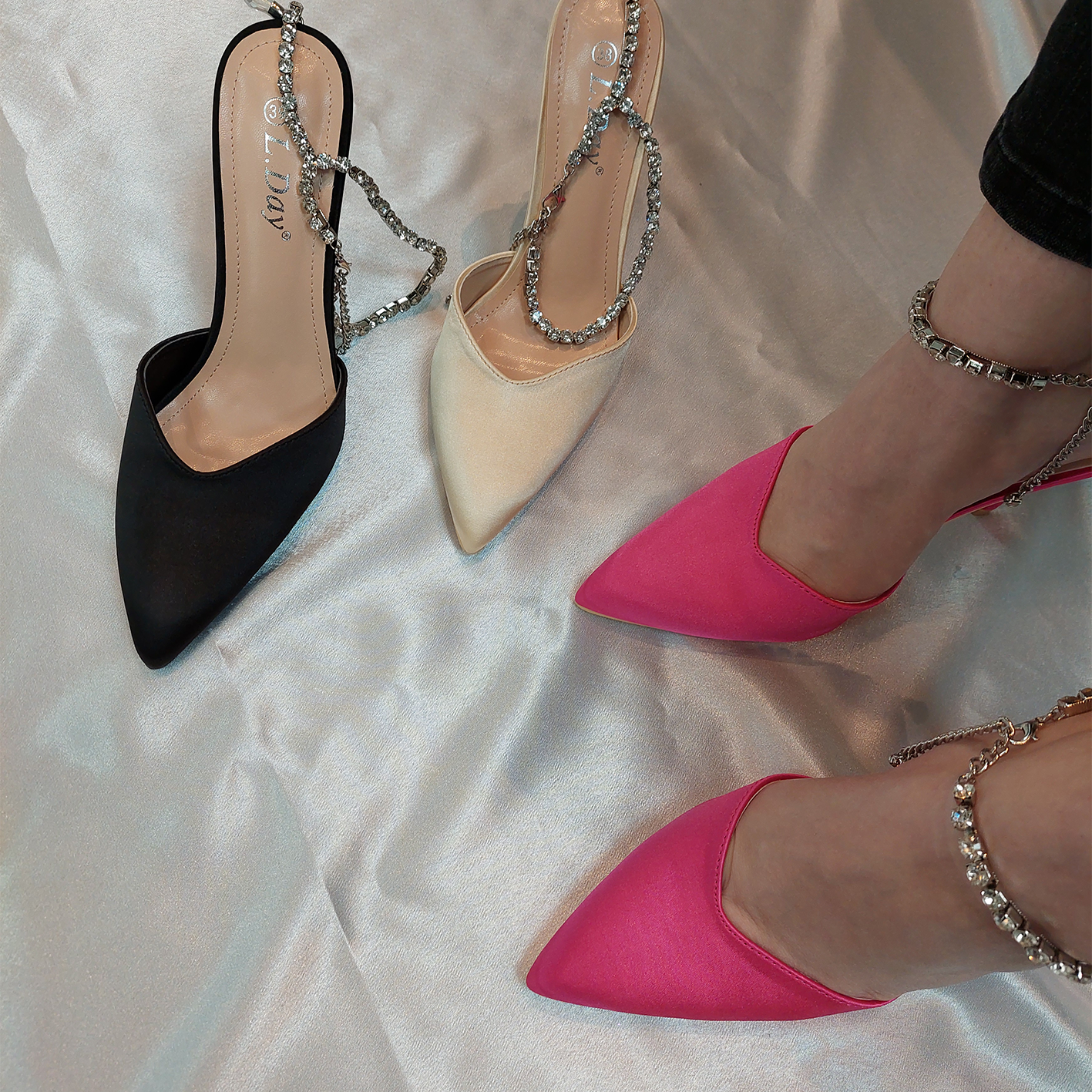 Front view of women's Celestial satin court shoes with diamante ankle chain in fuchsia, black, beige, sparkling London style from DeepsLondon.