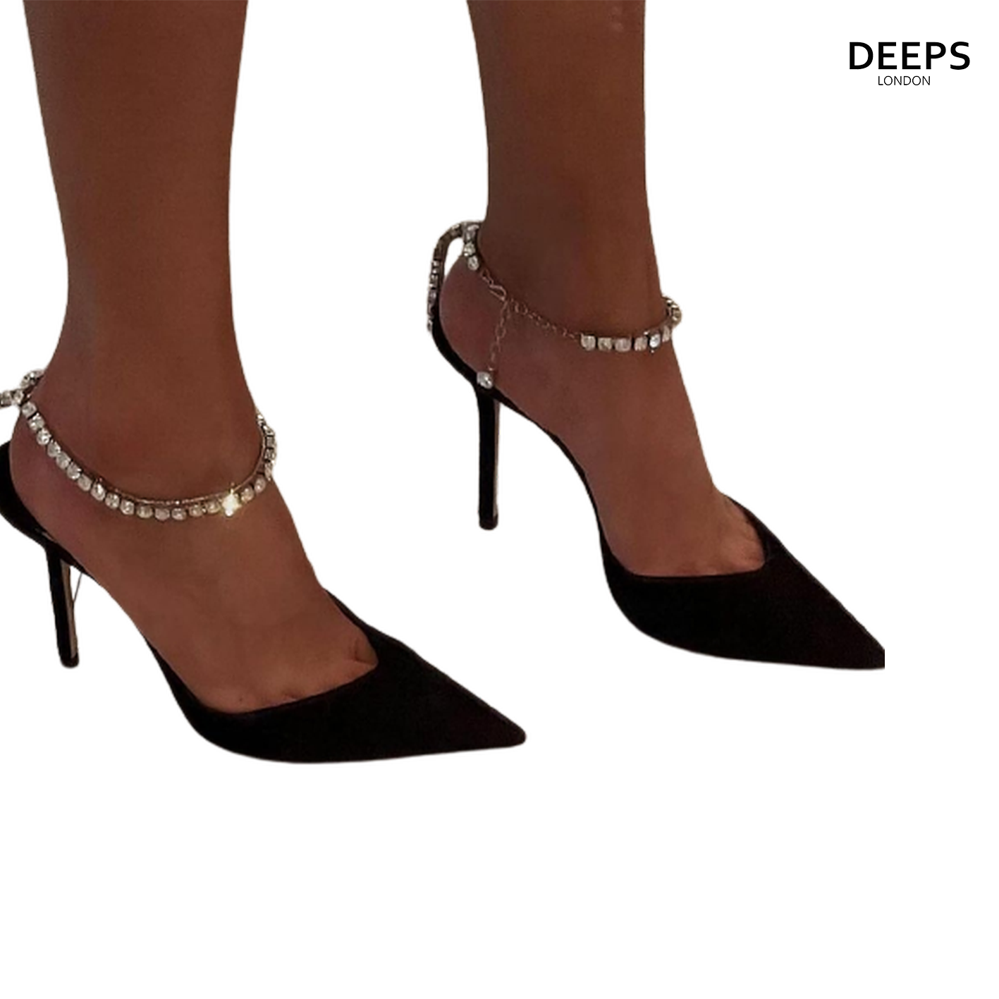 Woman's foot wearing stylish Celestial satin court shoes with diamante ankle chain in black, a fashionable choice for London events from DeepsLondon.