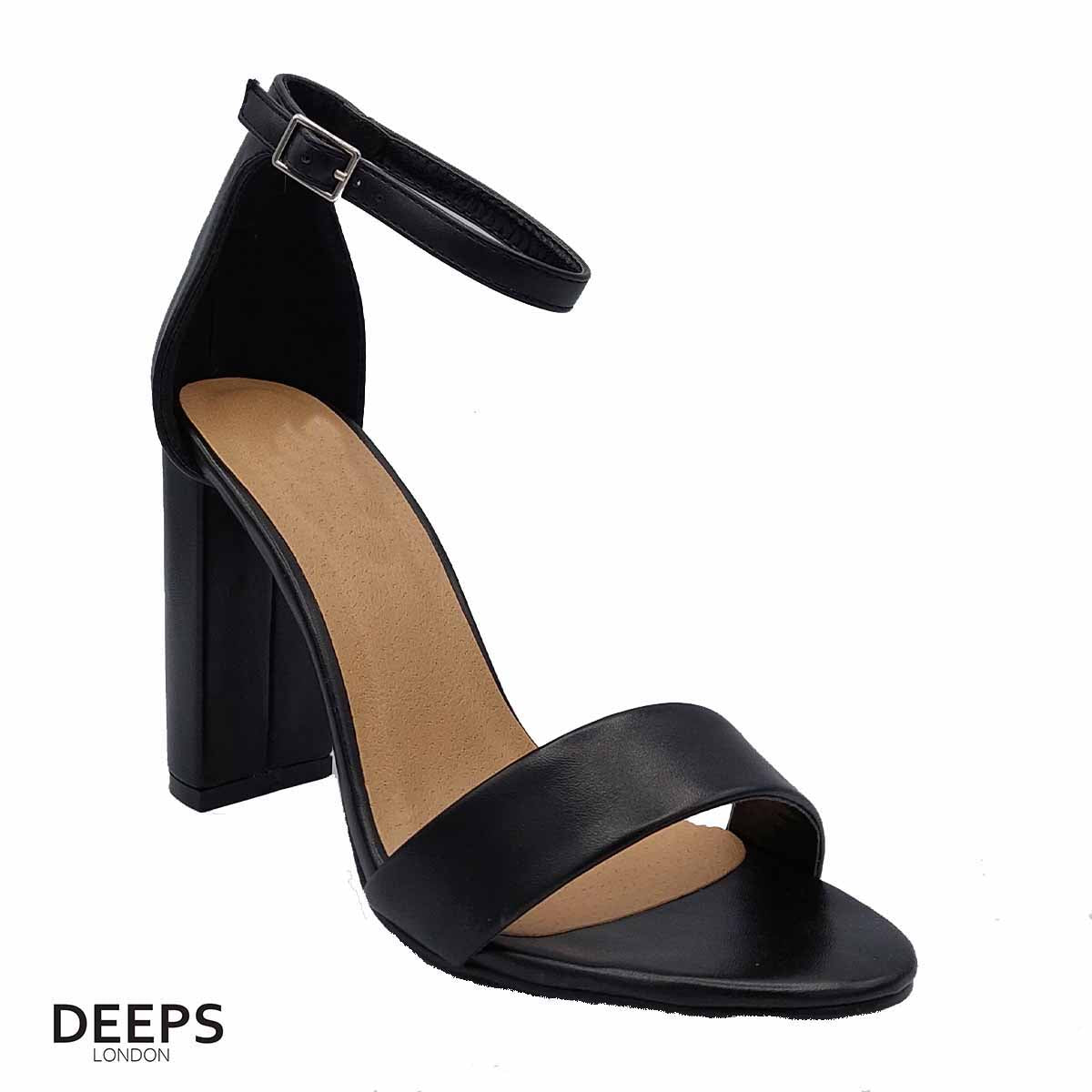 Front view of women's chunky buckle strap block heel sandals with a 9.5cm heel in black, a statement style for London fashion from DeepsLondon.