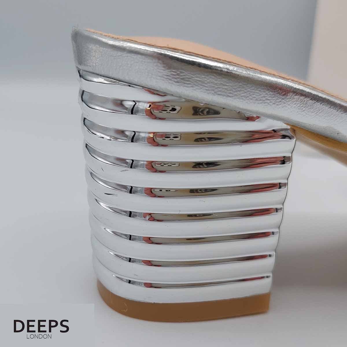 Close-up of the diamante detail on the strap of women's block heel slider sandals in silver, highlighting their elegant features from DeepsLondon.