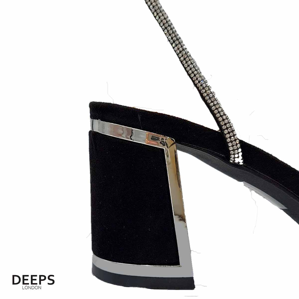 Close-up of the diamante detailing on the triple front straps and the block heel of women's open back sandals in black suede, highlighting their elegant features for London evenings.