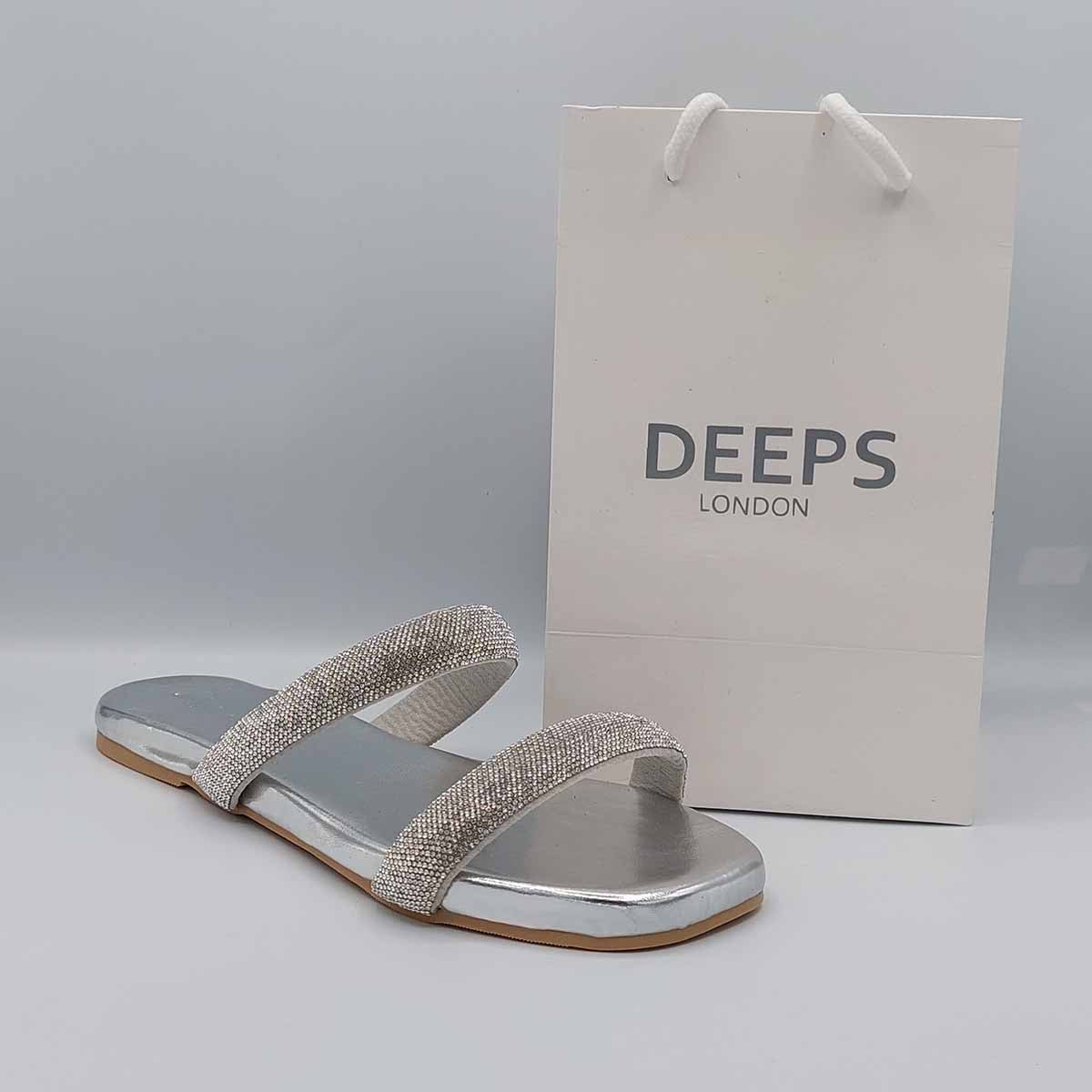 Side profile of women's double strap embellished flat slider sandals in silver, showcasing their comfortable design and sparkling detail for London style.