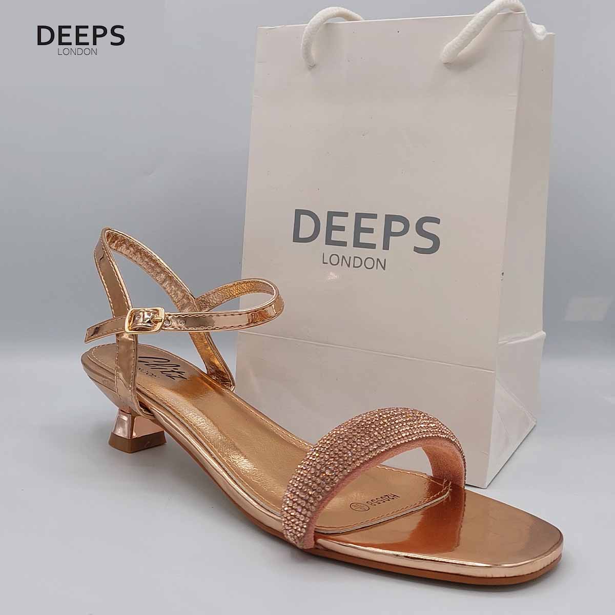 Side profile of women's Glimmer low flared heel sandals with diamante embellishments in champagne, showcasing the low flared heel and sparkling straps for London fashion.