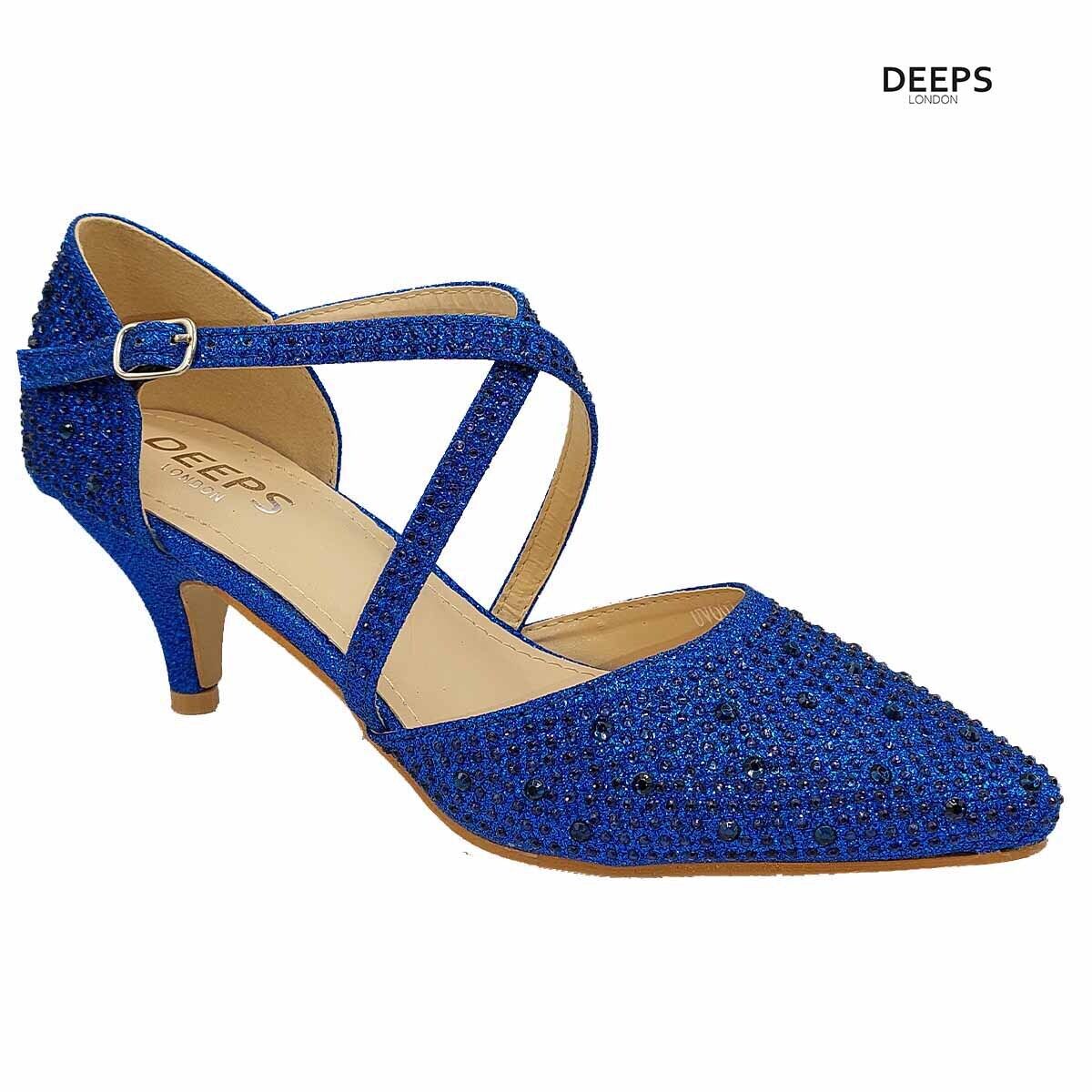 Woman's foot wearing stylish Illuminate diamante ankle strap kitten heel court shoes in Navy diamande, a fashionable and elegant choice for London events from DeepsLondon.
