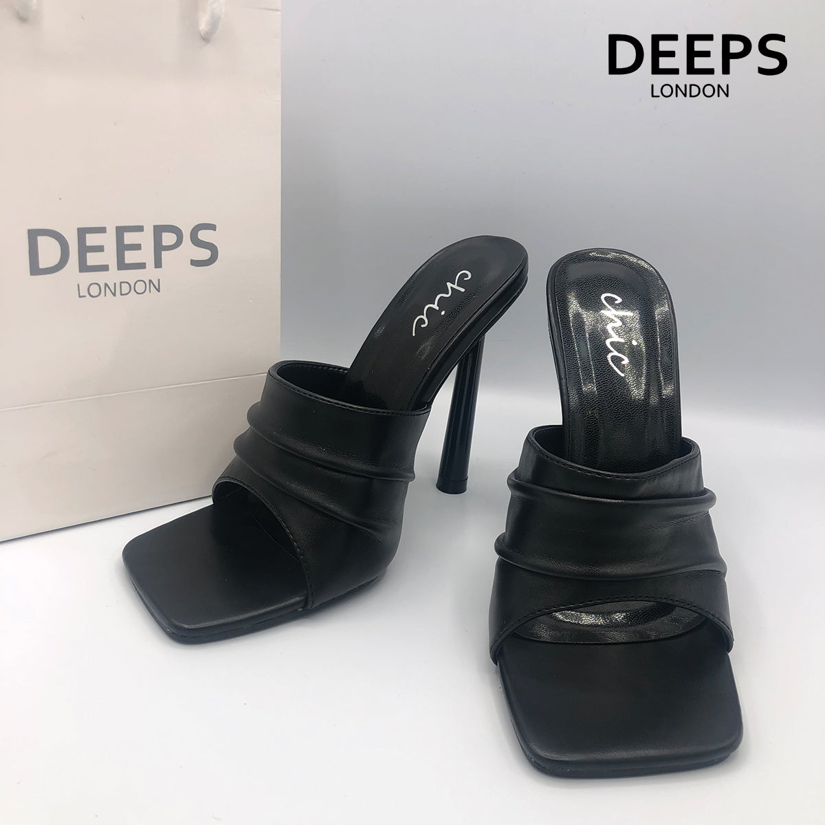 Close-up detail of Lea padded mule slip-on heel in black, highlighting the comfortable padded design, London style from DeepsLondon.