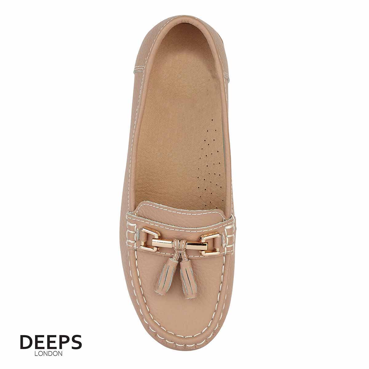 Front view of women's leather slip-on casual shoe in beige with tassel detail, a versatile style from DeepsLondon.