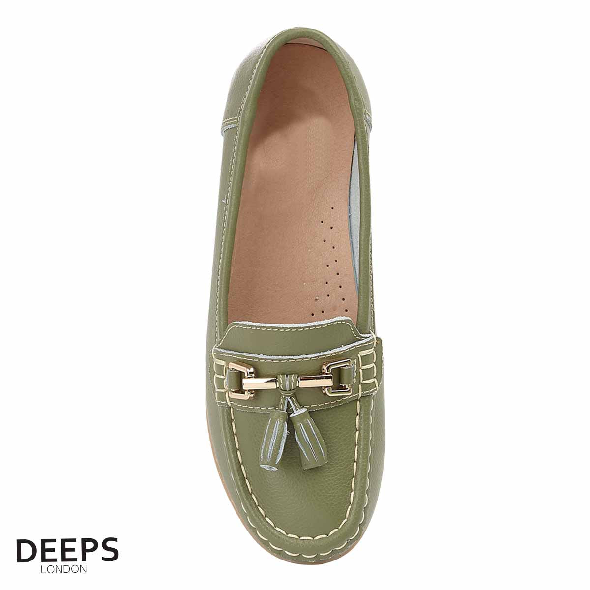 Side profile of women's leather slip-on mocassin/boat shoe in green with tassels, showcasing its comfortable design for London wear.
