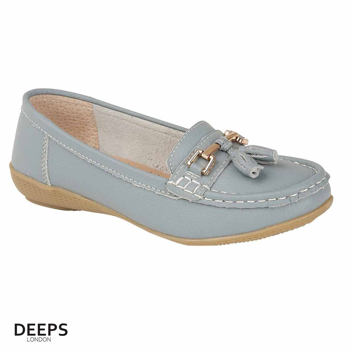 Front view of women's leather slip-on casual shoe in light blue with tassel detail, a versatile style from DeepsLondon.