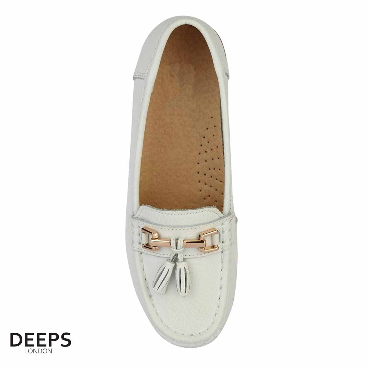 Front view of women's leather slip-on casual shoe in white with tassel detail, a versatile style from DeepsLondon.