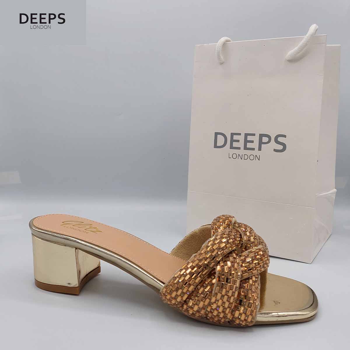 Front view of Lenora plaited gemstone band block heel mules in gold, showcasing the comfortable block heel and sparkling gemstone strap, London style from DeepsLondon.