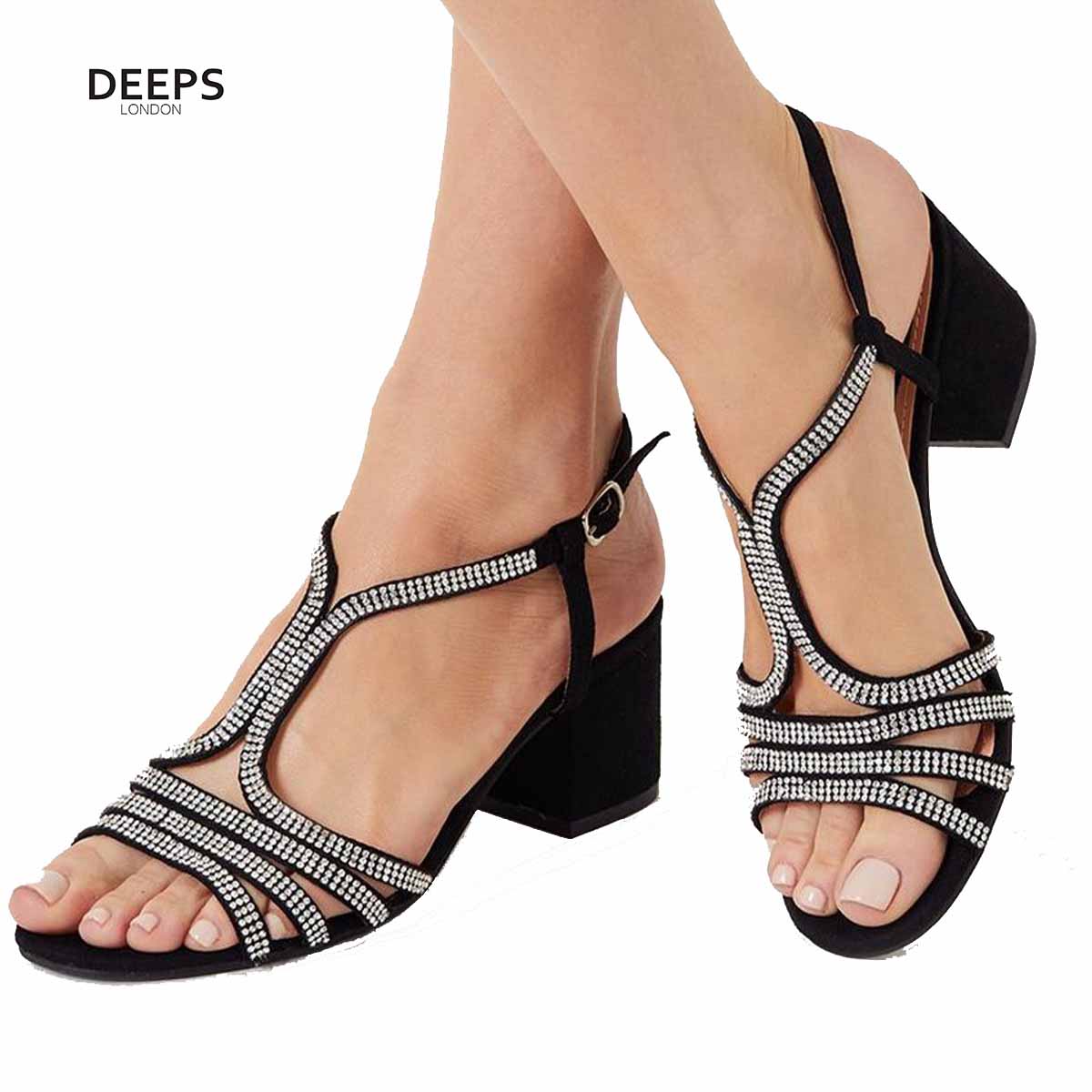 Woman's foot wearing stylish Lumina open toe block heel sandals with diamante detail in black, a fashionable and comfortable choice for London events from DeepsLondon.