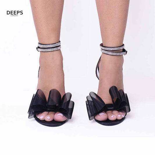 Front view of Majesty organza bow high heel sandals in black satin, showcasing the elegant high heel and delicate organza bow, London style from DeepsLondon.