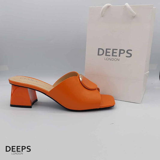 Side profile of women's open toe mule sandal with block heel in Orange, showcasing the block heel and easy slip-on design for London fashion.