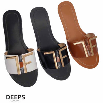 Front view of women's white open toe flat slider sandals with a gold bar detail, a chic and versatile option for London.