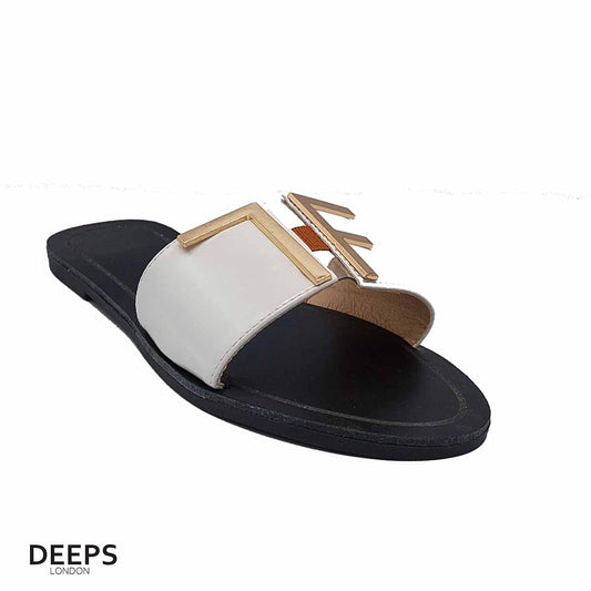 Side profile of women's white open toe flat slider sandals featuring a gold bar detail, showcasing their easy slip-on style for London comfort.