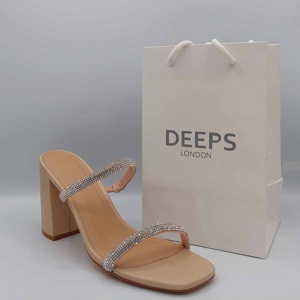 Front view of women's Starlight diamante chunky heel mules in beige, glamorous slip-on style for London from DeepsLondon.