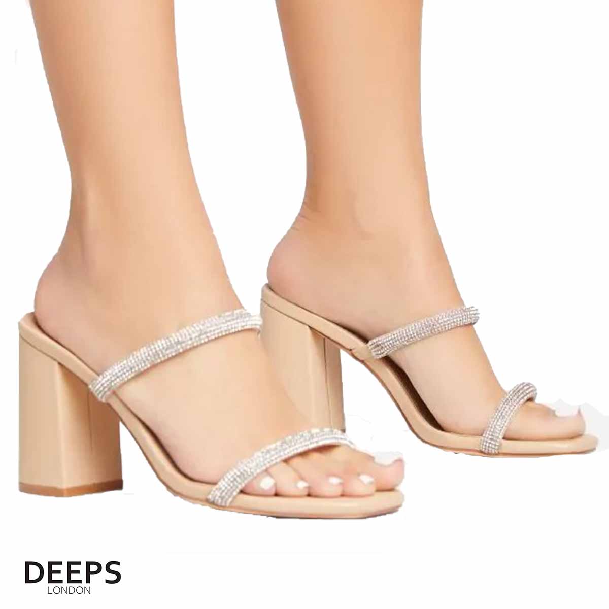 Woman's foot wearing stylish Starlight diamante chunky heel mules in beige, a comfortable and fashionable choice for London days or evenings from DeepsLondon.
