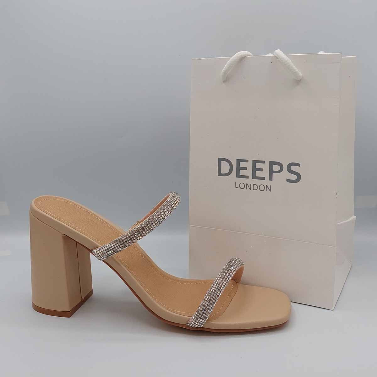 Side profile of women's Starlight diamante chunky heel mules in beige, showcasing the chunky heel and sparkling strap detailing for London fashion.