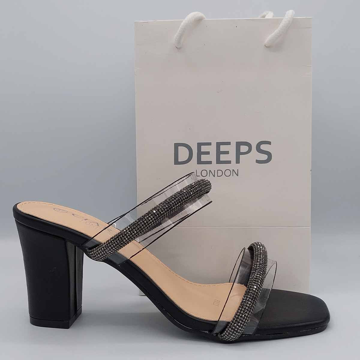 Side profile of Yuna clear diamante chunky heel mules in black, highlighting the stylish chunky heel and clear strap design, London style from DeepsLondon.