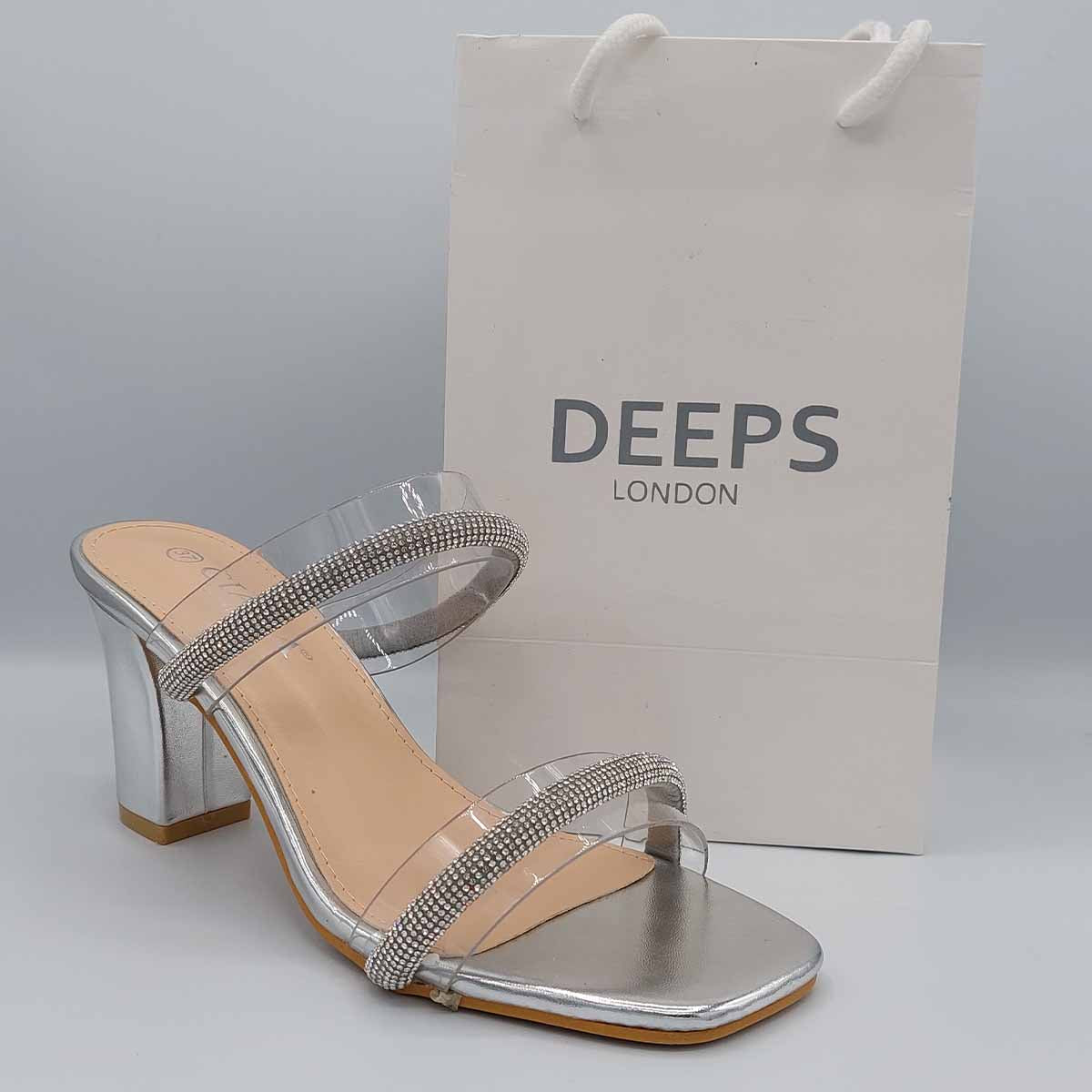 Front view of Yuna clear diamante chunky heel mules in silver, showcasing the bold chunky heel and sparkling diamante details, London style from DeepsLondon.