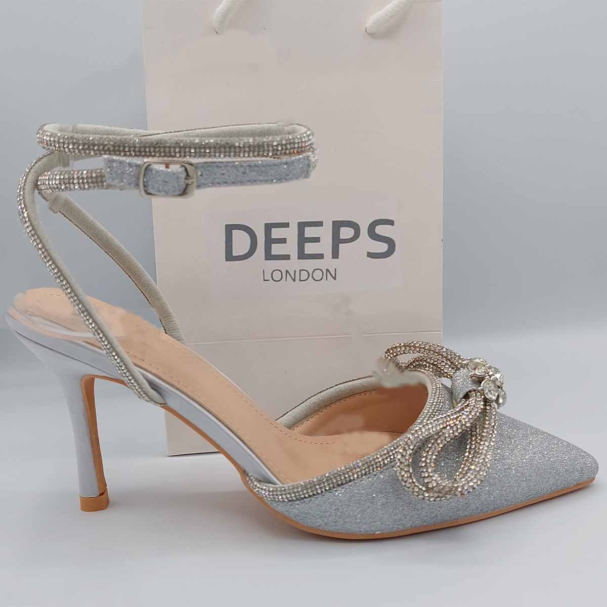 Side profile of Zala double bow court heels in silver fine glitter, highlighting the classic court shoe design and heel, London style from DeepsLondon.